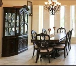Dark Wood Dining Table, 6 Chairs & China Cabinet Set With Carvings Used. Price: $1300.00.