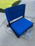 Outdoor Leisure Products 21" Folding Stadium Chair Blue New. Price: $40.00.