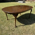 Ethan Allen Georgian Court Queen Anne Cherry Oval Dining Table Cane Back Chairs Used. Price: $800.00.