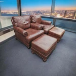 Pair Of Bradington Young Reclining Leather Club Chairs And Matching Ottomans Used. Price: $2700.00.