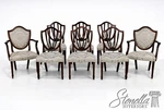 L72080: Set Of Eight Baker Mahogany Shield Back Dining Chairs Used. Price: $4295.00.