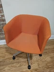 Erg International Orange Swivel Office Chair W/ Wheels Metal Frame Used. Price: $80.00.