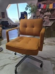 The Shaw-walker Company Upholstered Orange Conference Chair, Swivel Casters Used. Price: $2500.00.
