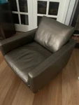 Natuzzi Leather Italian Designer Arm Chair Swivel Base Used. Price: $1550.00.