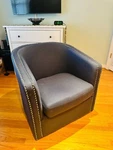 Barely Used Noble Home Navy Blue Occasional Swivel Chair. Price: $150.00.