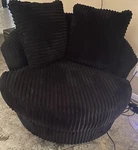Signature Design By Ashley Furniture Gramwell Onyx Swivel Chair Used. Price: $375.00.
