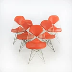 1957 Herman Miller Eames DKR-2 Dining Side Chairs Set Of Five W/ Orange Pads Used. Price: $4750.00.