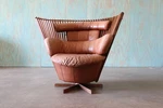 Pacific Green Tavarua Swivel Lounge Chair Palm Wood And Leather C. 2000S Used. Price: $4600.00.