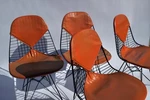Available-third Gen 1964 Charles Eames DKR-2 Eiffel Bikini Chairs, Blk & Org Used. Price: $265.00.
