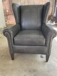 Smith Brothers Black Leather Accent Chair With Nailhead Trim Open. Price: $450.00.