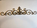 Homeroots Wrought Iron Scroll Wall Hanging 28" Long Used. Price: $50.00.