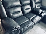 Power Reclining Sectional Sofa With Cup Holders And Console By Ashley Furniture Used. Price: $350.00.