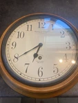 Sterling & Noble Round Wood Frame Analog Wall Clock, Arabic Numerals Brown/white Used. Price: $18.00.